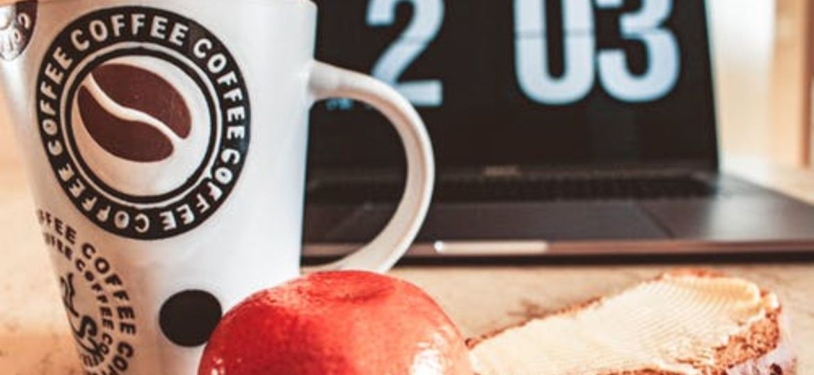 apple, bread and coffee mug