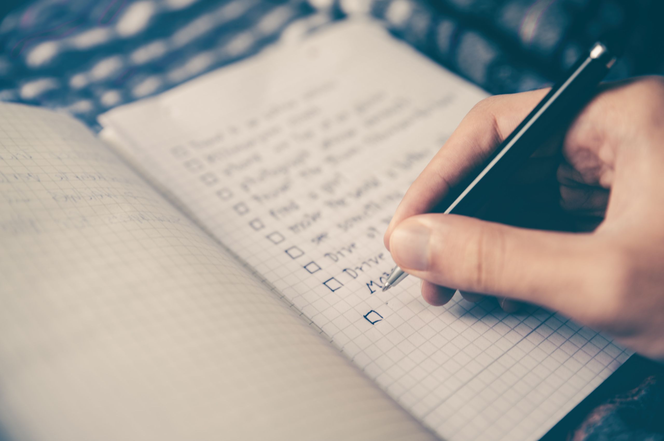 someone writing a list